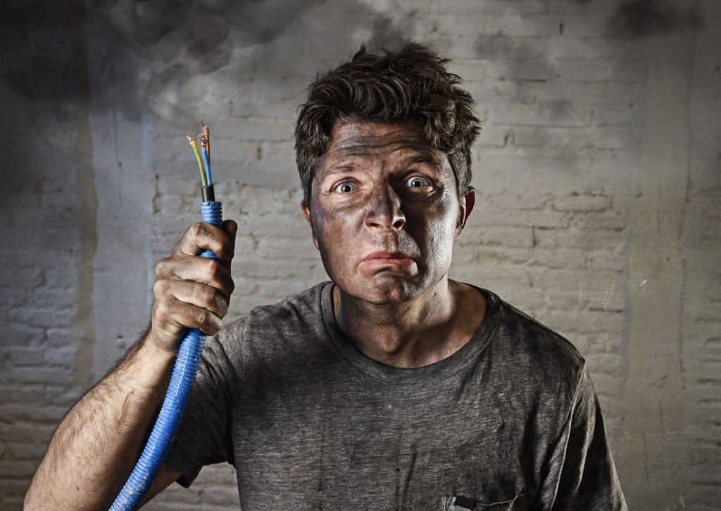 a bad electrician burn himself of fixing the wire